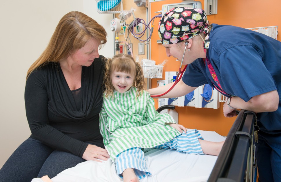 CHEO staff with a patient