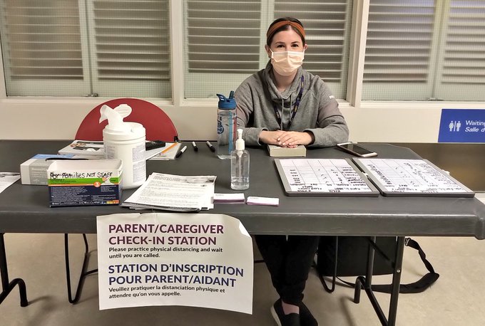 Parent/caregiver check-in station provides masks and support for navigating CHEO