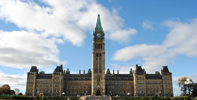 Photo of parliament hill, with clear blue skies