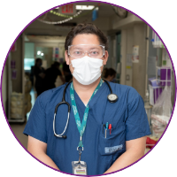 Photo of a CHEO nurse standing in a hallway