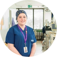 Photo of a CHEO nurse standing in a hallway