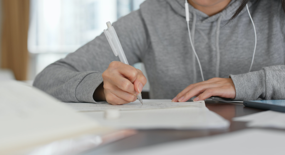 Boy taking notes