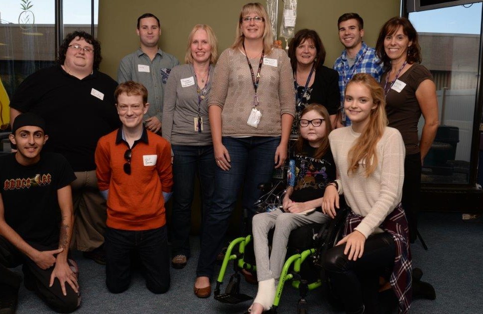 Youth Forum members pose together as a group in CHEO's cafeteria