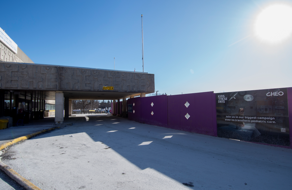 main entrance of cheo with hoarding for ITC and sunny sky