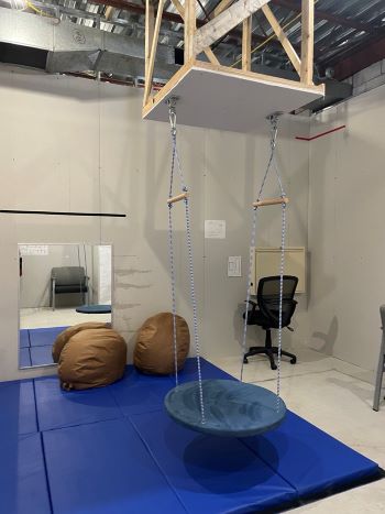 swing hangs in warehouse for layout of new treatment centre