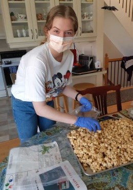 Girl in a mask baking