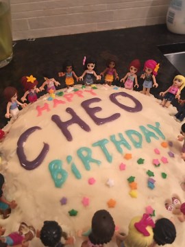 Cake with 'Happy CHEO birthday' in icing