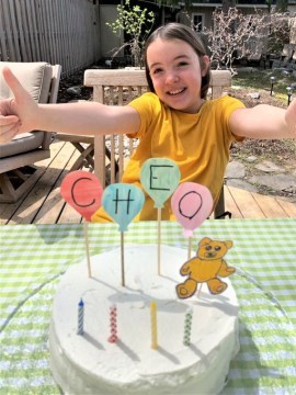 Young girl and a birthday cake