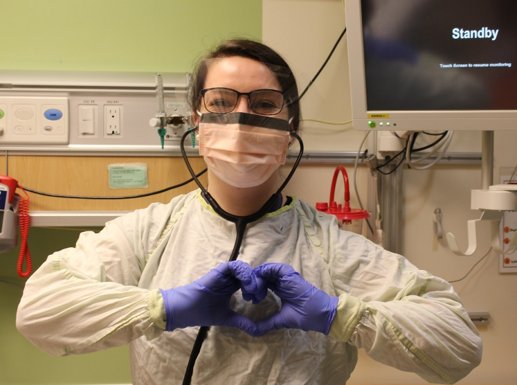 Molly, a CHEO nurse, wearing PPE and smiling