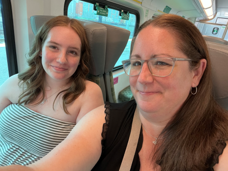 girl and mom on train