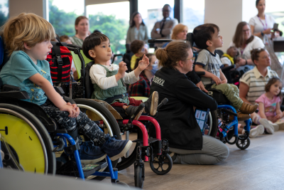 kids watch musicians from wheelchairs