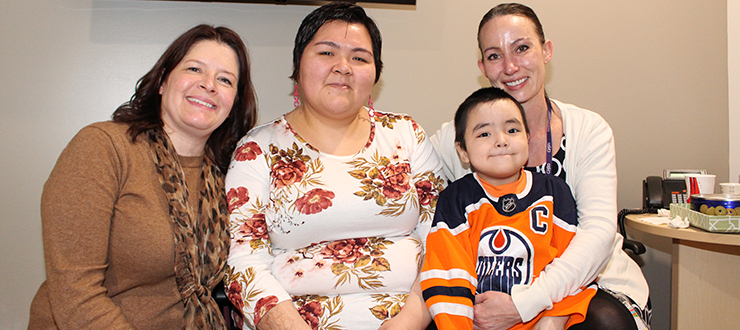 Carolyn Roberts, Nina Kautuk, her son Jutanie, and Kerri-Lynn Whyte