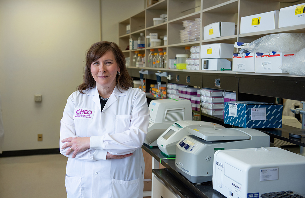 doctor kim boycott stands in lab with arms crossed