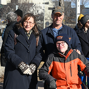 Osborne family stands at rare disease day flag raising