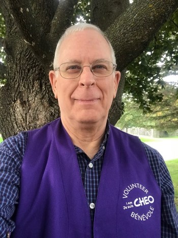 Rick Patch in purple volunteer vest