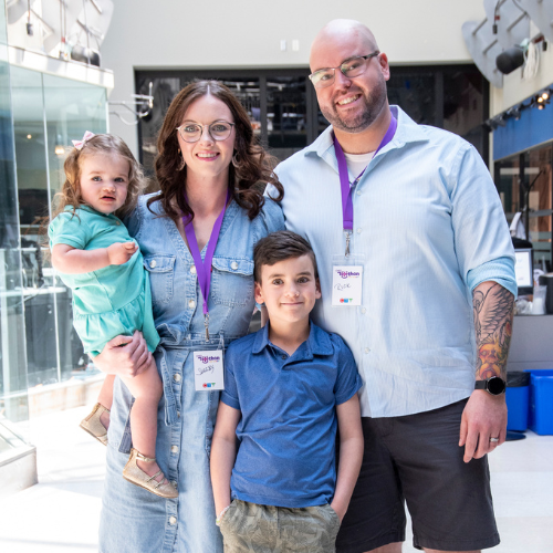 Olivia's family gather for a picture in her memory