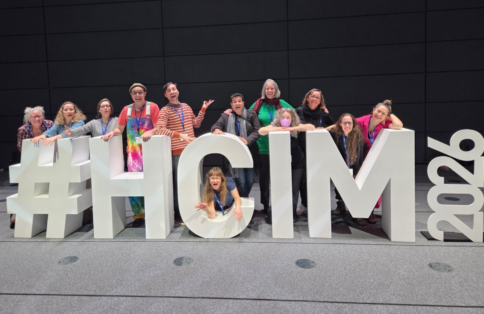 zedd the clown and other canadian therapeutic clowns pose with large hcim