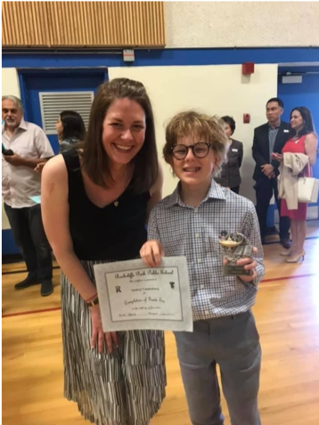 Andrej with award certificate