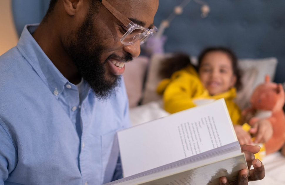 Father reading a book 