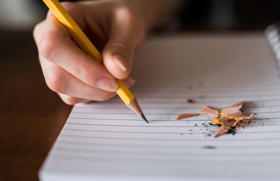 Child taking notes