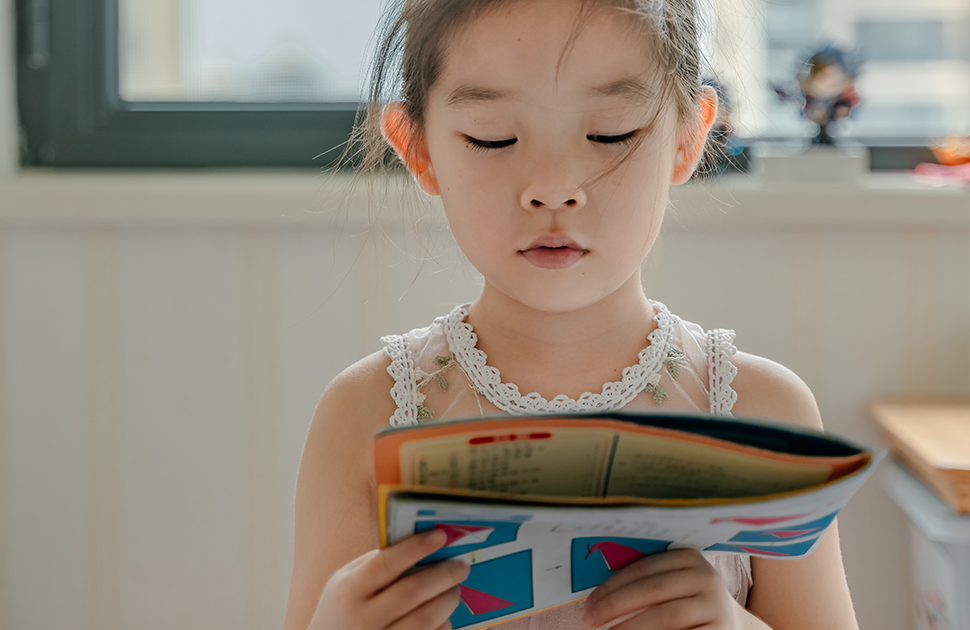 Child reading a book