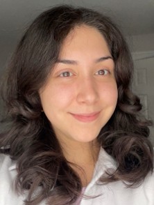 Woman with dark wavy hair